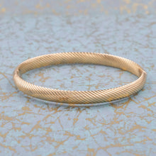 Gold Bangle with Slanted Rib Pattern