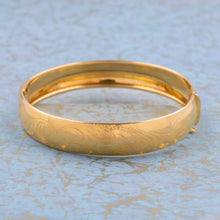 Gold Bangle with Etched Plume Pattern