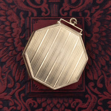 Gold Locket with Garnet Cabochon c1910