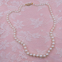 Graduated Strand of Collar Length Pearls