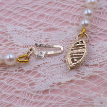 Graduated Strand of Collar Length Pearls