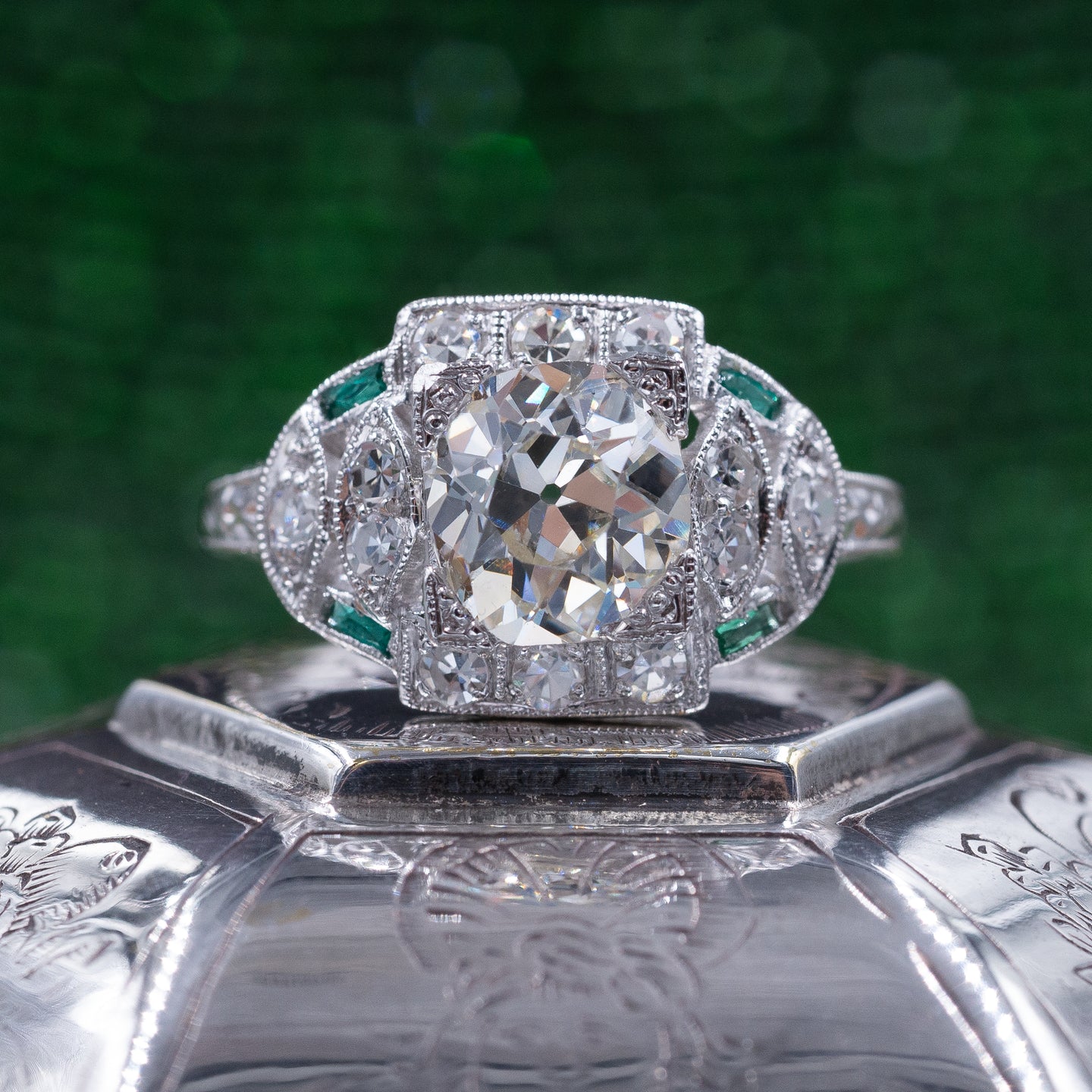 Old Mine Cut Diamond Ring with Emerald Accents c1920