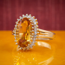 Precious Topaz and Diamond Halo Ring