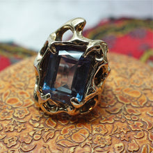 circa 1970 heavy handmade 14k gold Brutalistic style ring with color changing synthetic Alexandrite