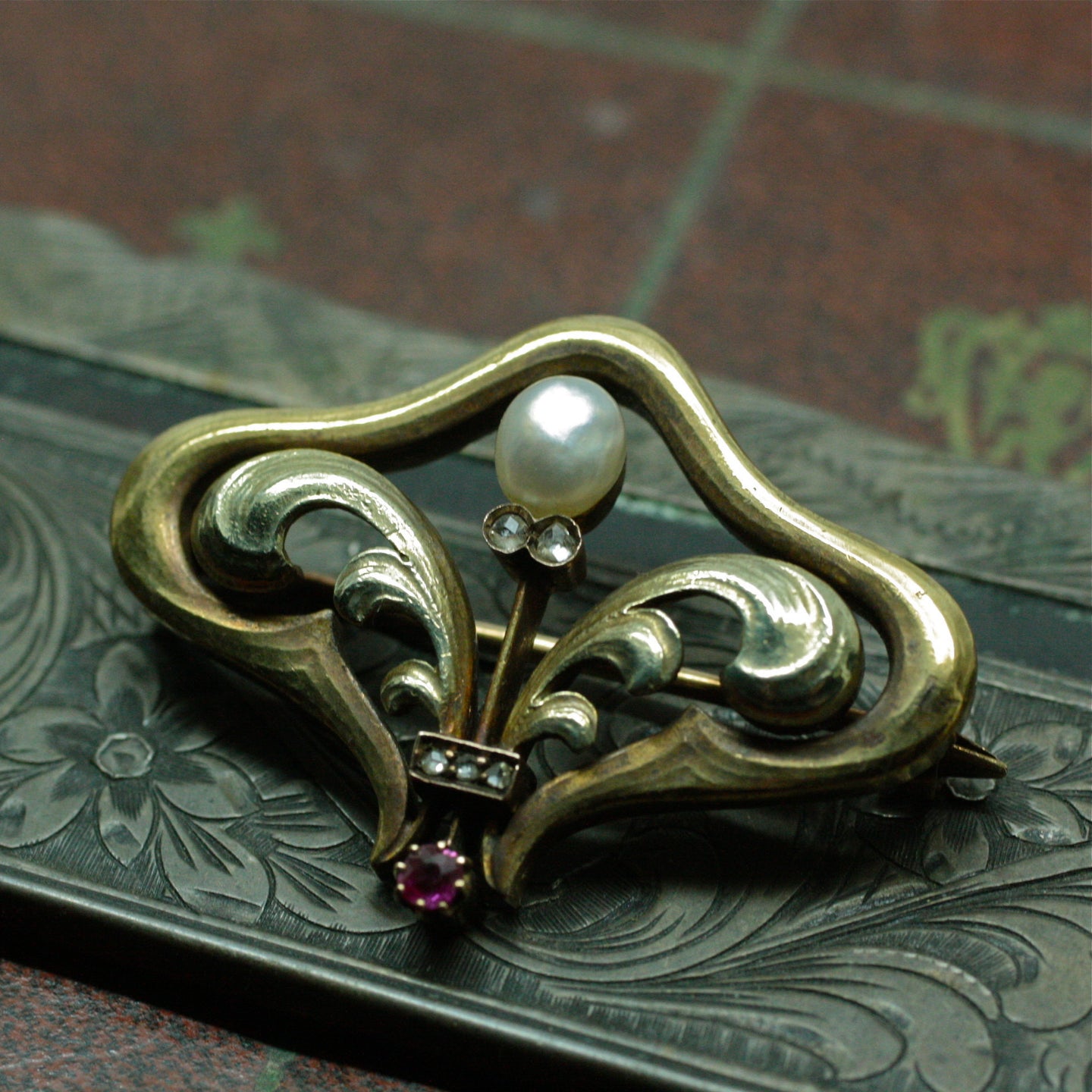 Circa 1900 Art Nouveau 14k, natural pearl, diamond and ruby brooch