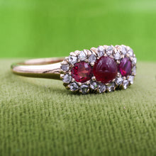 Three Stone Ruby Ring with Rose Cut Diamond Halo c1900