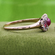 Three Stone Ruby Ring with Rose Cut Diamond Halo c1900