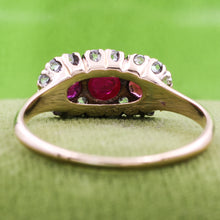 Three Stone Ruby Ring with Rose Cut Diamond Halo c1900