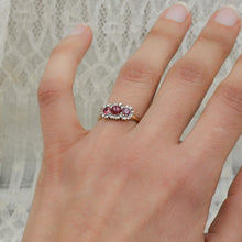 Three Stone Ruby Ring with Rose Cut Diamond Halo c1900