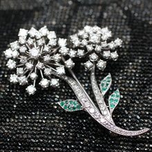 Circa 1950 Platinum, Diamond, Emerald Flower Pin