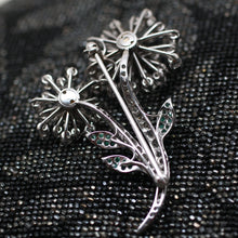 Circa 1950 Platinum, Diamond, Emerald Flower Pin