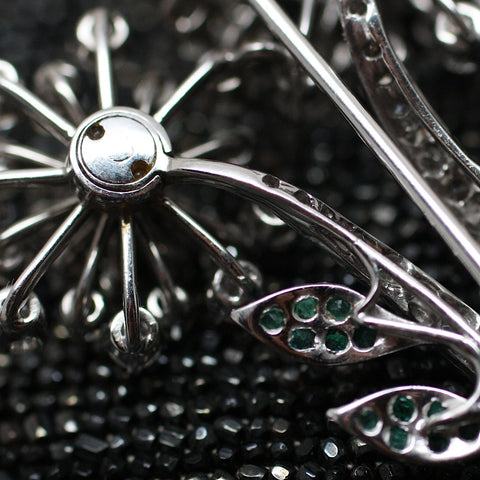 Circa 1950 Platinum, Diamond, Emerald Flower Pin