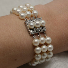 Circa 1950's 14k pearl & diamond multi-strand bracelet