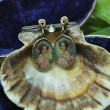 Circa 1930s 14k portrait earrings with hand painted details