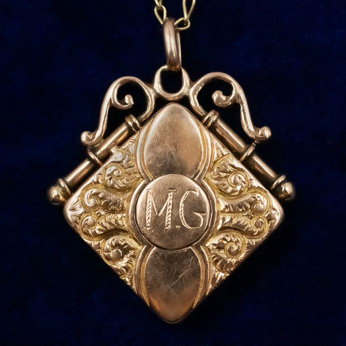 Handchased Gold Scroll Locket c1875